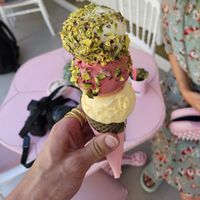 Pineapple, cherry, mandarine in cone with pistachio at Dream Cream in Rhodes