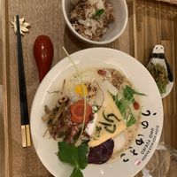 New Year’s Ramen with rice/vegan cheese addition, plus pickles in the little dish  at Uno Yukiko - Gion Soy Milk Ramen - ぎをん豆乳らーめん うのゆきこ in Kyoto