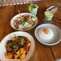 Pumpkin nugget salaf, matcha with oat milk, tofu in spicy sauce, rice😄 at Over the Moon Cafe in Sanur