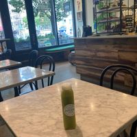 Juice, and tables to sit and imbibe at Juicery Harlem in New York City