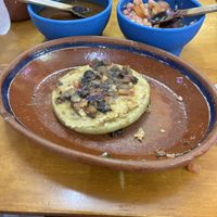 Un gordito con frijoles y papas   at Gorditas Doña Lola in San Pedro Tlaquepaque