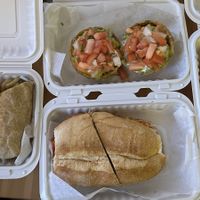 The entire spread! Chimi, twisted burrito, mofongitos de carne, mac and beef empanada, and yaroa empanada   at Next Stop Vegan in Brooklyn