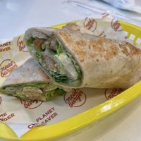 Caesar wrap. Delicious. My four year old loved it too  at Neat Burger - Dubai Mall in Dubai