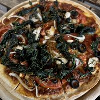 Vegetarian pizza without the cheese   at Planet Earth in Ayutthaya