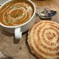 Tomato soup and vegan cheese jaffle   at Kanéla Café  in Cape Town