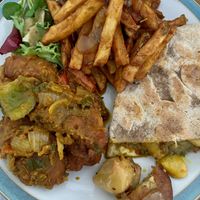 Sample of masala fries, bhagun and bean roti & cauliflower pakora khurchan   at Naany's in Bedford