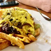 Loaded chucky chips with balsamic onions, poppers  and vegan cheese  at The Moorings in Loughborough