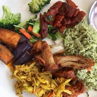 Mint rice, broccoli, mock meat char soy, eggplant, mock meat rendang, radish salad.  at Hare Krishna in Penang