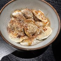 Gemischte Gemüsedumplings in scharfer Sesamsauce  at Kaschemme in Nuremberg