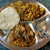 2 curries (1 is under rice) and rice with poppadom at Govindas in West End