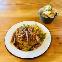 Lentil lasagna, roasties with mayo  at Canteen at The Eco Park in Porthtowan