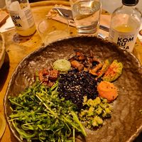 Midterrean bowl with black rice. Delicious! However, coming from the nordic cuisine, I found the vanilla pure quiet odd to this combination. at Honest Greens - Avenida in Lisbon