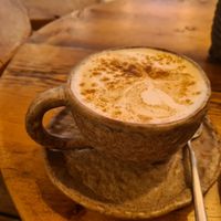 Tuneric chai latte with almond milk. at Honest Greens - Avenida in Lisbon