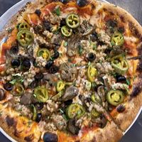 Vegan pizza with vegan sausage   at Oak & Stone in Sarasota