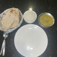 Yellow lentil curry, rice and roti.  at Tikka N Talk in Bangkok