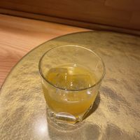 Tangerine sake  at Vegan Izakaya NIJIYA 虹屋 in Kyoto