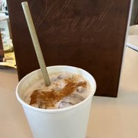One iced latte with coconut milk to go.   at Bowl Acai Bar in Puerto Ayora