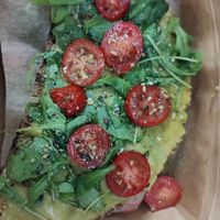 Toast with hummus and avocado to take away at SHOTS Coffee & Brunch in Girona