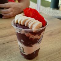 Acai berry mush, veggie protein, peanuts, banana and strawberry slices at Oakberry in Portimao