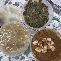 Mashed potatoes with gravy, collard greens, and candied sweet potatoes  at Colossal Vegan - Cloud Kitchen in Belleville