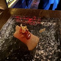 Dessert—gold leaf pear   at Omakaseed in New York City
