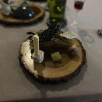 Desserts dish, house made ice cream with cane sugar stick, a gel like sweet coated in strawberry gum and chocolate sweet topped with finger lime  at The Flackyard in Pinnacle