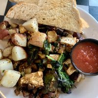 Tofu scrambler with breakfast potatoes and sourdough  at Cathedral Cafe in Fayetteville