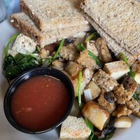 Tofu scrambler with vegan sausage  at Cathedral Cafe in Fayetteville