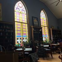 Some of the light from the beautiful stained glass windows shining throughh  at Cathedral Cafe in Fayetteville