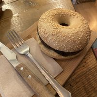 Warm bagel with hummus and eggplant  at The Coffee House in Barcelona
