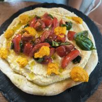 Tosta de hummus (deliciosa) at Sanito in Punta Uva