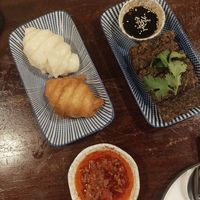 Duo mantou and crispy chive cakes at Lhong Khao in Phuket