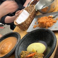 kontomire (down left) fufu, peanut fufu (up left), kenkey (up right), jollof rice (down right)  at DIDI PA - West African Kitchen in Berlin