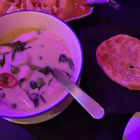 Green curry with roti  at Khunnai Sam Restaurant in Phuket