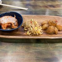 Kimchi, sprouts, sesame potatoes  at Jang Dok Dae in Flushing