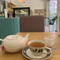 Almond milk and English breakfast tea   at The Village Bakery and Cafe in Siem Reap