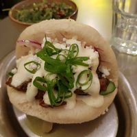 Hercules (gyros inspired) bao with wakame bowl in background at Lil Bao  in Brussels