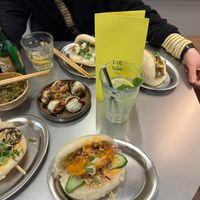 “Bao lover mix” with two sides (pickled cucumber and wontons) and with lychee juice and ginger beer  at Lil Bao  in Brussels