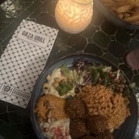 Falafel bowl with hummus, baba ganoush, muhammara, bulgar and pomegranate dressing.  at Gaza Grill Kødbyen in Copenhagen