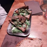 Bruschetta con crema di piselli, fave e carciofi at Osteria Grandma in Rome