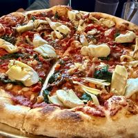 Vegan pizza with artichokes, basil, etc. (ordered without cheese) at Three Rivers Pizzeria in Farmington