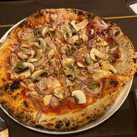 Jackhammer pizza with onions and green olives  at Tegridy Foods in Redcar