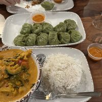 Mixed vegetable curry and vegan made veggie MOMO   at The Market At Malcolm Yards in Minneapolis