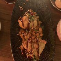 Delicious samosas with chickpeas in a chutney sauce  at Rickshaw & Co in Glasgow