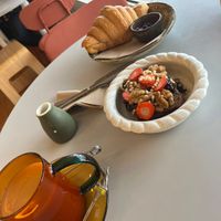 Chai tea, plain croissant and loaded banana bread.   at The Gator Club in College Park