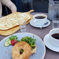 Veggie Flammkuchen & vegan avocado bagel at Cafino in Munich