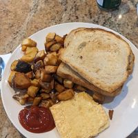 Just Egg patty, potatoes, and toast at The Breakfast Pig in Sault Ste Marie