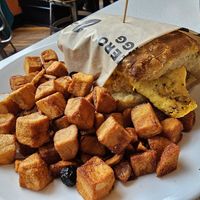 Vegan breakfast sandwich w/ homefries at Square Cafe in Pittsburgh
