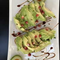 Bread with Hummus + Avocado  at Schwarzes Schaf in Velden Am Woerthersee