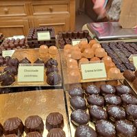 Creme vanilla at back right, clearly labelled vegan at Chocolatier Van Oost  in Bruges
